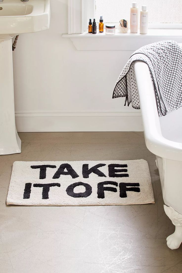 Quirky slogan bath/door mat : Take it off