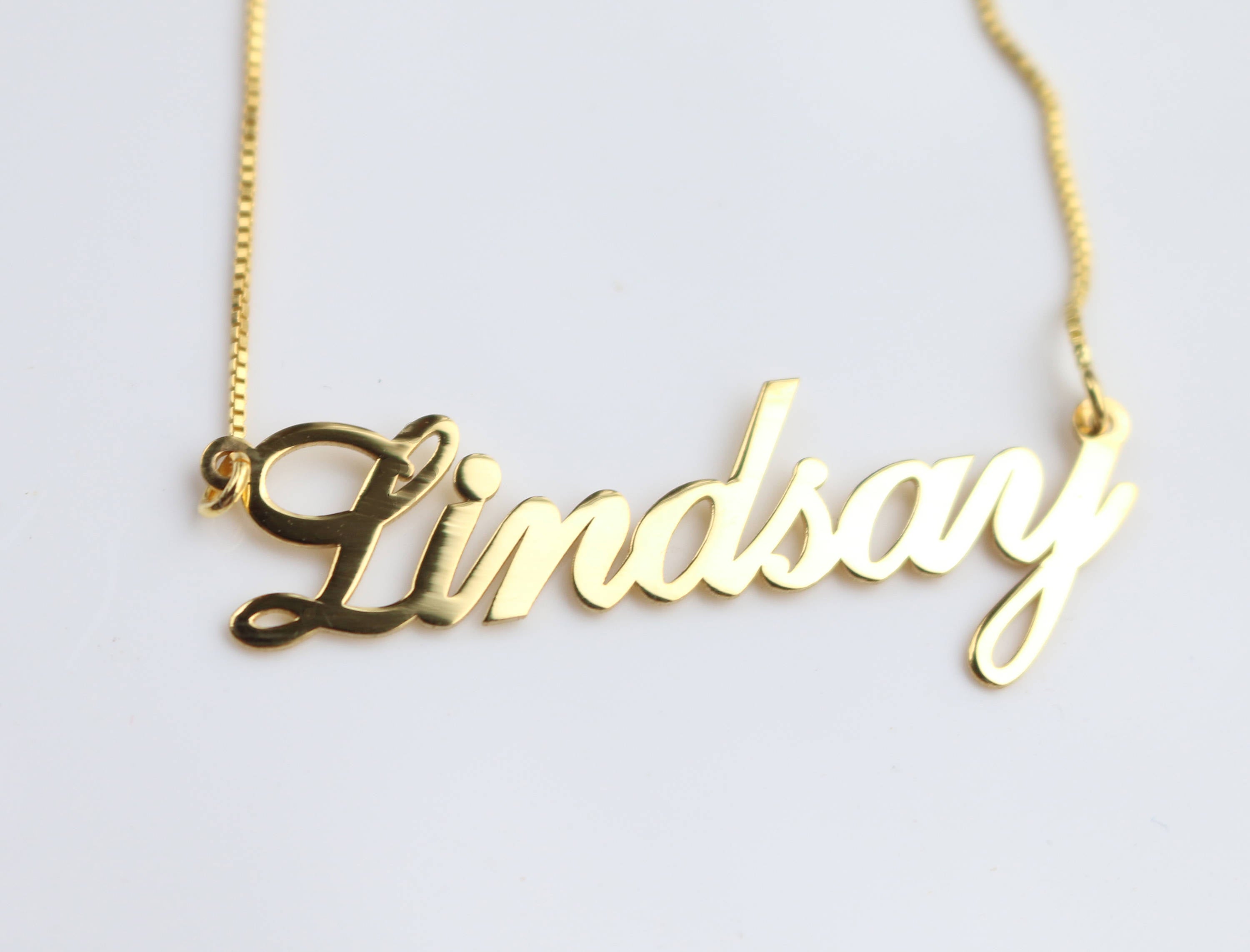 Gold name store initial pendant